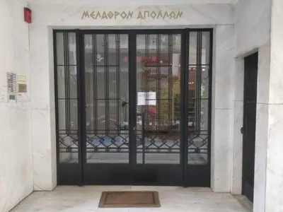 an entrance to a building with an iron gate at Apollonos Studio Amalia in Athens