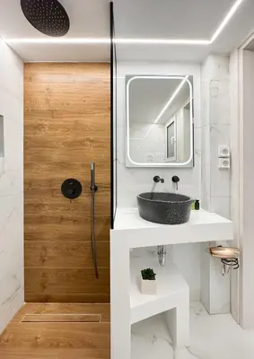 a bathroom with a sink and a mirror at Modern Comfort in the Heart of Athens in Athens