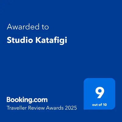 a screenshot of a phone with the text awarded to studio katittitt at Studio Katafigi in Anavissos