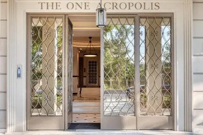 an entrance door to the one arroyoos at The One Acropolis in Athens