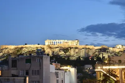 a view of the acropolis of athens from atop a mountain at Mood Athens Luxury Apartments and Suites in Athens