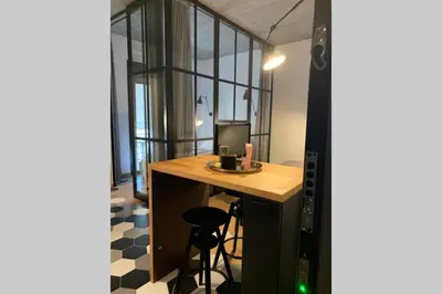 a room with a desk with a laptop computer on it at WYN Comfort Studio in Kallithea Near SNFCC and Seasi in Athens
