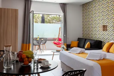 a living room with a couch and a table at STAY INN in Athens