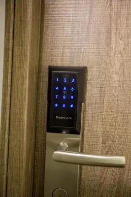 a close up of a soap dispenser on a bathroom door at Raise Acropolis View Suites in Athens