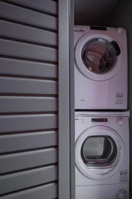 a washing machine and a dryer in a room at Vagabond Guesthouse in Athens
