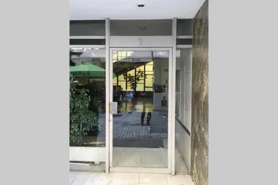 an entrance to a building with an open glass door at 2 Bedroom Acropolis Apartment in Athens