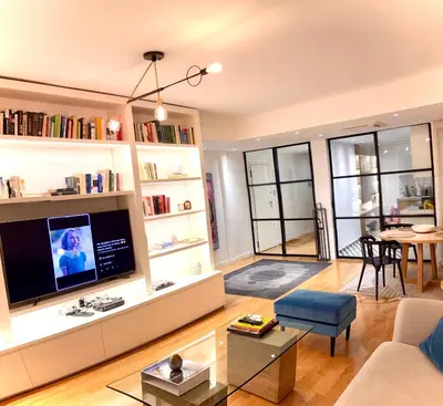 a living room with a couch and a tv at Luxury 2 bedroom 2 bathroom flat in Kolonaki ! in Athens