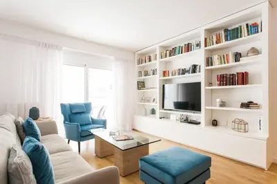 a living room with a couch and a tv at Luxury 2 bedroom 2 bathroom flat in Kolonaki ! in Athens