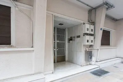an outside view of a building with an open door at Luxury 2 bedroom 2 bathroom flat in Kolonaki ! in Athens