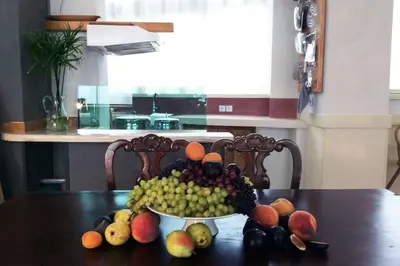 a bowl of fruit sitting on top of a table at Unique - Spacious Studio with rooftop / Thissio in Athens