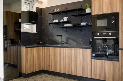 a kitchen with a stove and a microwave at Luxury Apt near the Beach Athens Riviera by Olon in Athens