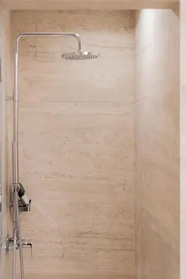 a shower with a shower head in a bathroom at Kolonaki Luxury Residence in Athens