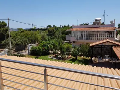 arial view of a building with a roof at Casa Denva in Kalívia Thorikoú