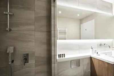 a bathroom with a shower and a sink at Charitos IΧ, Chic n modern 2BD Apt in Athens