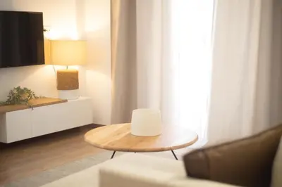 a living room with a coffee table and a couch at Urban Boho apartment in Koukaki in Athens