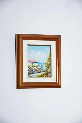 a picture of a painting on a white wall at TRADITIONAL HOUSE in Athens