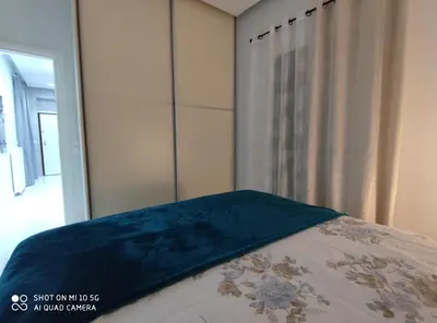 a bedroom with a bed and a mirror at Modern apartment with a huge terrace in Athens