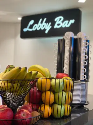 a basket of fruit on a counter in a store at NLH MONASTIRAKI - Neighborhood Lifestyle Hotels in Athens