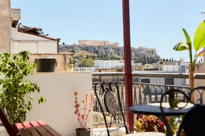 a balcony with a view of the acropolis at Mosaics Athens Penthouse with Acropolis view in Athens