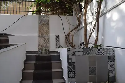 a staircase with tiles on the side of a building at h2h Anthi #Comfort apt near Athens in Athens