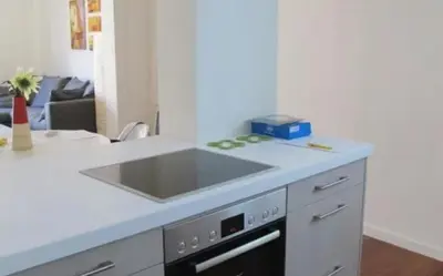 a kitchen with a sink and a stove at Plaka Sweet House 2 in Athens