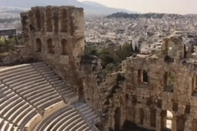 an old amphitheater with a view of a city at Cosy flat, perfectly located in historic centre! in Athens