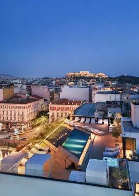 a view of a city with a swimming pool on a building at Skylark, Aluma Hotels & Resorts in Athens