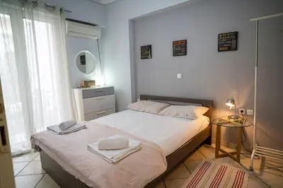 a bedroom with a bed with towels on it at 