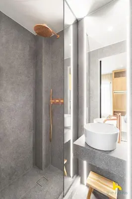 a bathroom with a white tub and a sink at Urban Views, Modern Apartment In The Heart of Athens in Athens
