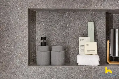 a shelf with two bottles of soap and towels at Urban Views, Modern Apartment In The Heart of Athens in Athens