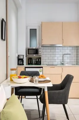 a kitchen with a table with food on it at Trikoupi 95 in Athens