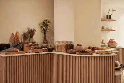 a buffet with food on top of a table at Vasi in Athens