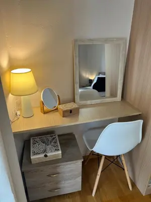 a bedroom with a desk with a mirror and a chair at Alimos Cozy Getaway, close to the beach in Athens