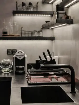 a kitchen with a counter with utensils on it at CASAGOLD Glyfada Luxury Apartment Near The Sea in Athens