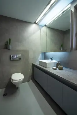 a bathroom with a white toilet and a sink at Elegant and Private Living by Neuvel in Athens