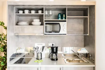 a kitchen with a sink and a microwave at A15 Premium appartment up to 4ppl next to Parthenon! in Athens