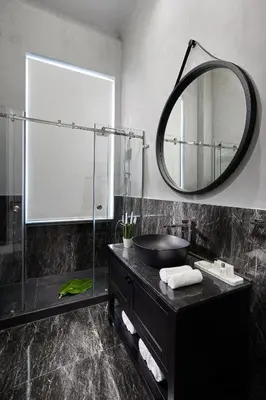 a bathroom with a sink and a mirror at MiraMe Athens Boutique Hotel in Athens