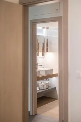 a bathroom with a sink and a mirror at Ports Crossroad E in Piraeus
