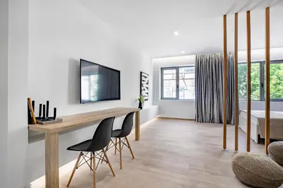 a bedroom with a desk and a bed at Central Boutique Apartment A2 in Athens