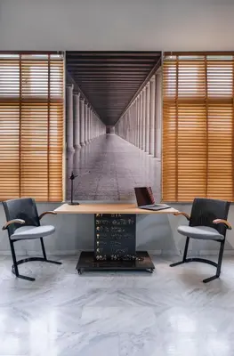 an office with a desk and two chairs and a corridor at Athens Heart Superior Loft under Acropolis in Athens