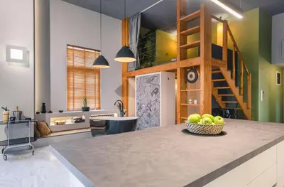 a kitchen with a counter with a bowl of apples at Athens Heart Superior Loft under Acropolis in Athens