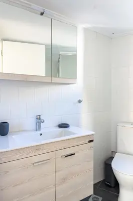 a bathroom with a sink and a toilet at Plaka Central in Athens