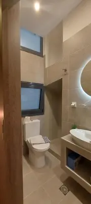 a bathroom with a toilet and a sink at D Spacious Brand New Studio Ideal for 2 D in Athens