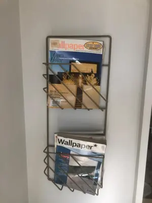 a shelf in a wall with boxes on it at kolonaki Penthouse panoramic Acropolis view in Athens
