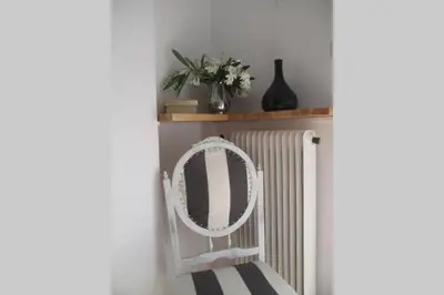 a room with a radiator and a mirror at Dream apartment in Athens