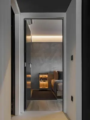 a room with a bed and a glass door at 3 Olive Trees in Anavissos
