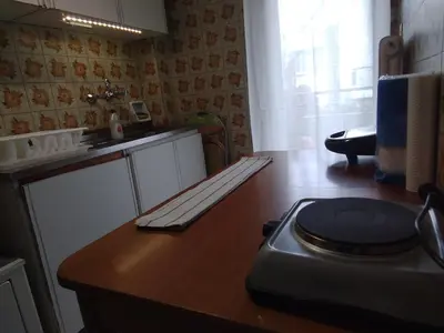 a kitchen with a counter top with a toaster on it at Studio in Athens in Athens