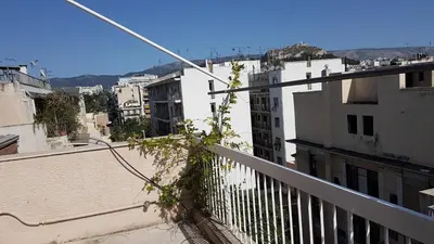a view of a city from a balcony at Sky Apartment - Athens Center, 5 BD, 4 BATH in Athens