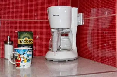 a white blender sitting on top of a counter at 7 Steps Apartment Metro Syggrou Fix near Acropolis in Athens