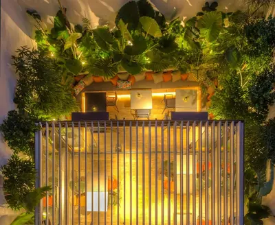 a room with a gate in front of a house at Ivis 4 Boutique Hotel in Athens